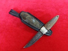 Нож Засапожный 1 сложный мозаичный Дамаск (ШХ15+М76Т+Никель); больстер - Тимаскус; рукоять - кубинский Бакаут и стабилизированный зуб мамонта.